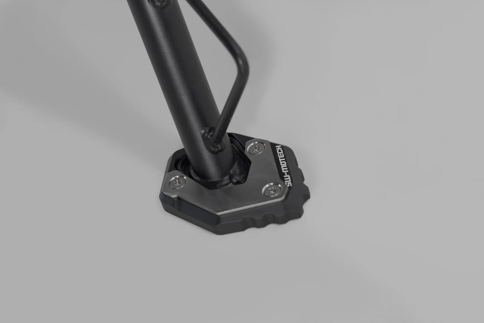 SW-Motech Extension for side stand foot - Black/silver. CFMoto 300NK / 800MT / 800MT-X.
